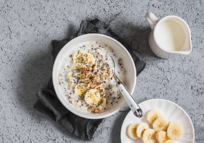 Coconut milk sweet quinoa porridge. Healthy breakfast. Top view, flat lay