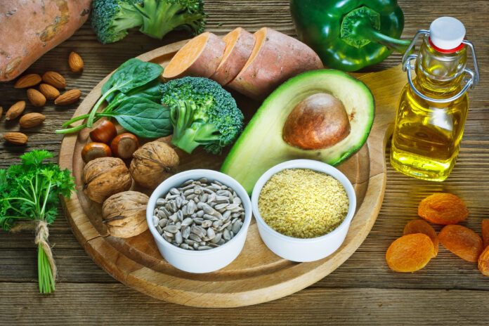 Foods rich in vitamin E such as wheat germ oil, dried wheat germ, dried apricots, hazelnut, almonds, parsley leaves, avocado, walnuts, sweet potato, broccolii, sunflower seeds, spinach, green paprika