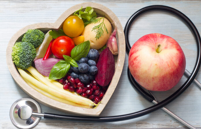 Healthy food in heart diet concept with stethoscope closeup