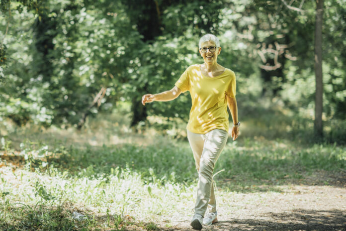 Intermittent walking workout, mature woman exercising, losing weight during menopause