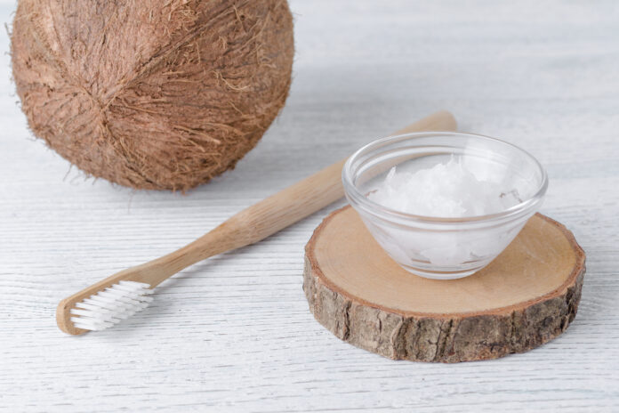 coconut oil toothpaste, natural alternative for healthy teeth, wooden toothbrush, dental equipment