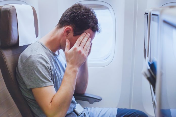 headache in the airplane